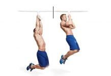 chico realizando pull ups o dominadas en casa con toalla