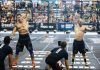 atletas realizando dumbbell snatch en los crossfit games