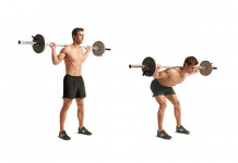 Chico realizando ejercicio Good morning en CrossFit con barra